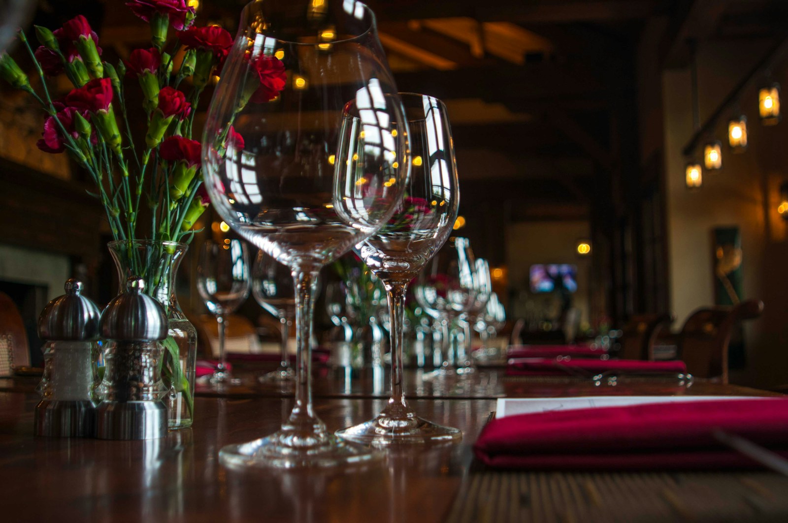 A set table with wine glasses